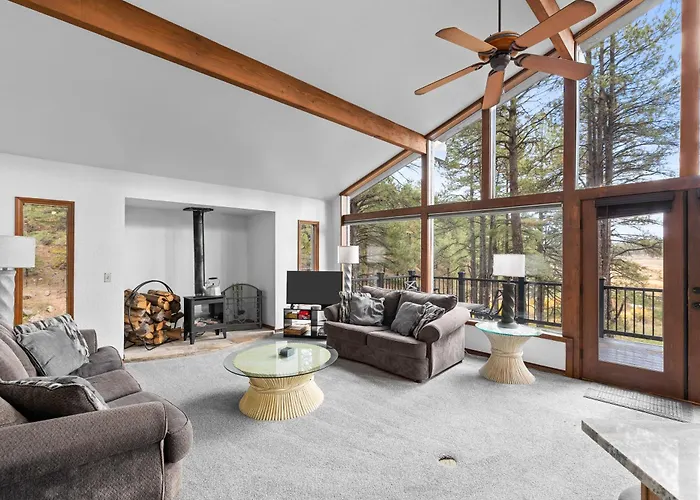 Forest Retreat Overlooking A Meadow Pond