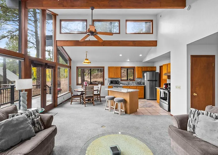 Forest Retreat Overlooking A Meadow Pond